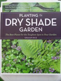 Book cover of Planting the Dry Shade Garden by Graham  Rice